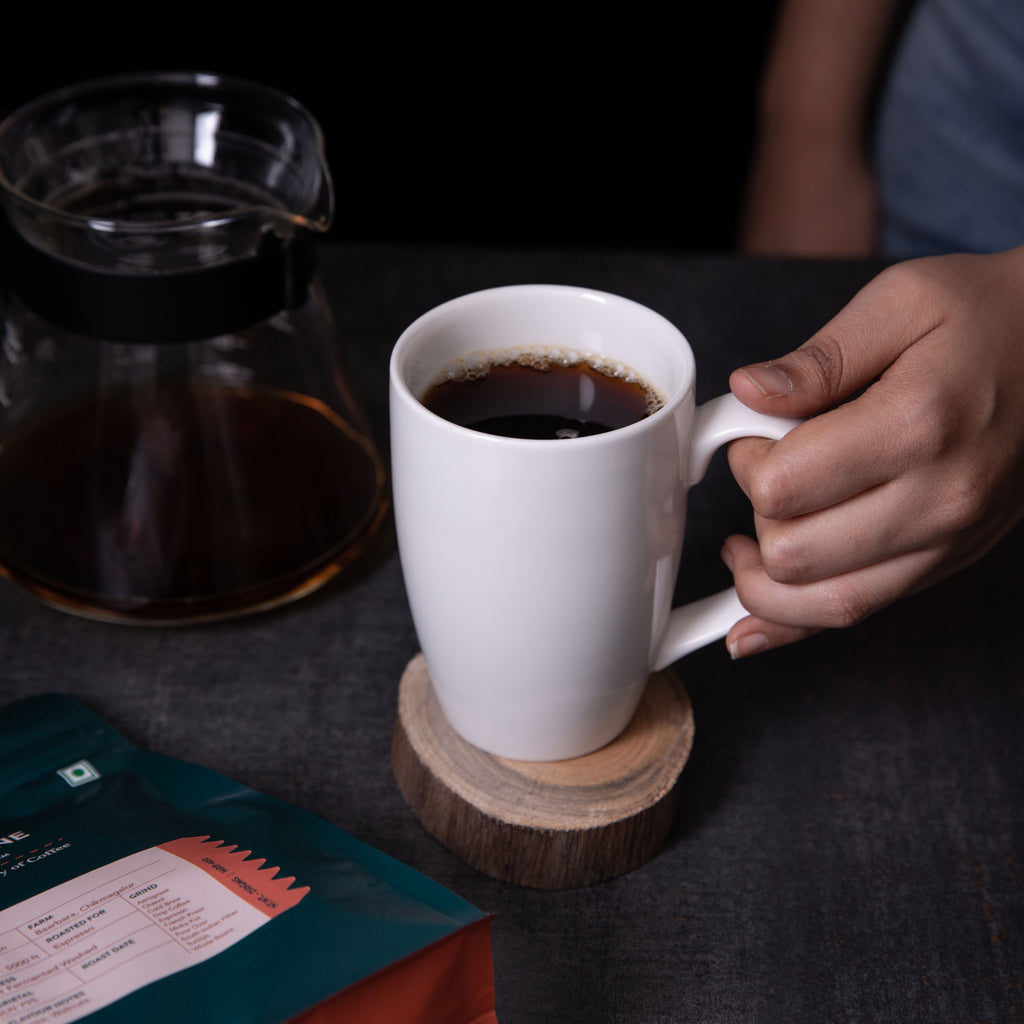 Coffee mug filled with coffee from the caffeine baar